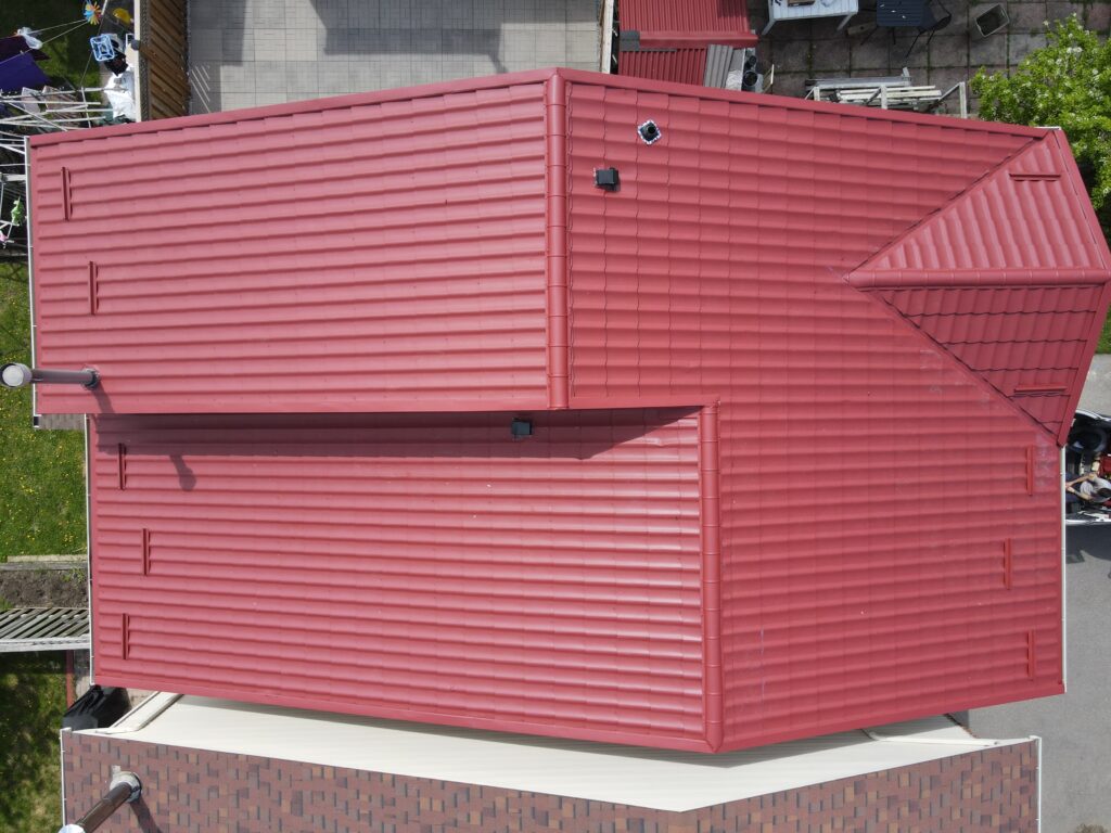 red roof drone view, vr metal roofing